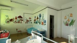 Acolo unde pereții prind culoare, zâmbetele aduse celor mici ajută la vindecare